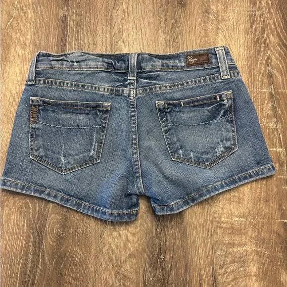 PAIGE Distressed Medium Blue Denim Shorts - Picture 2 of 8